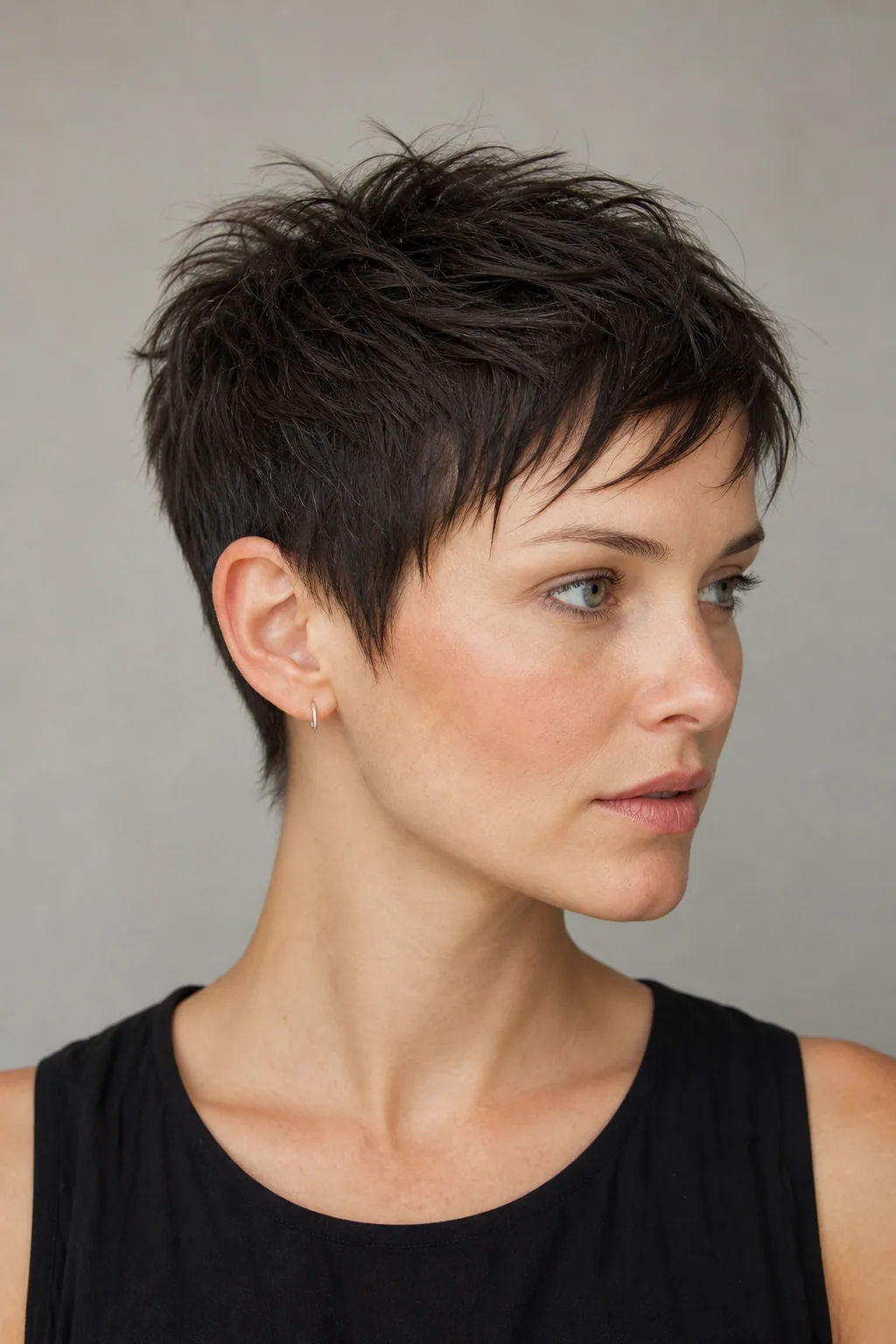 Classic textured pixie crop with a piece-y separated top on fine thin hair