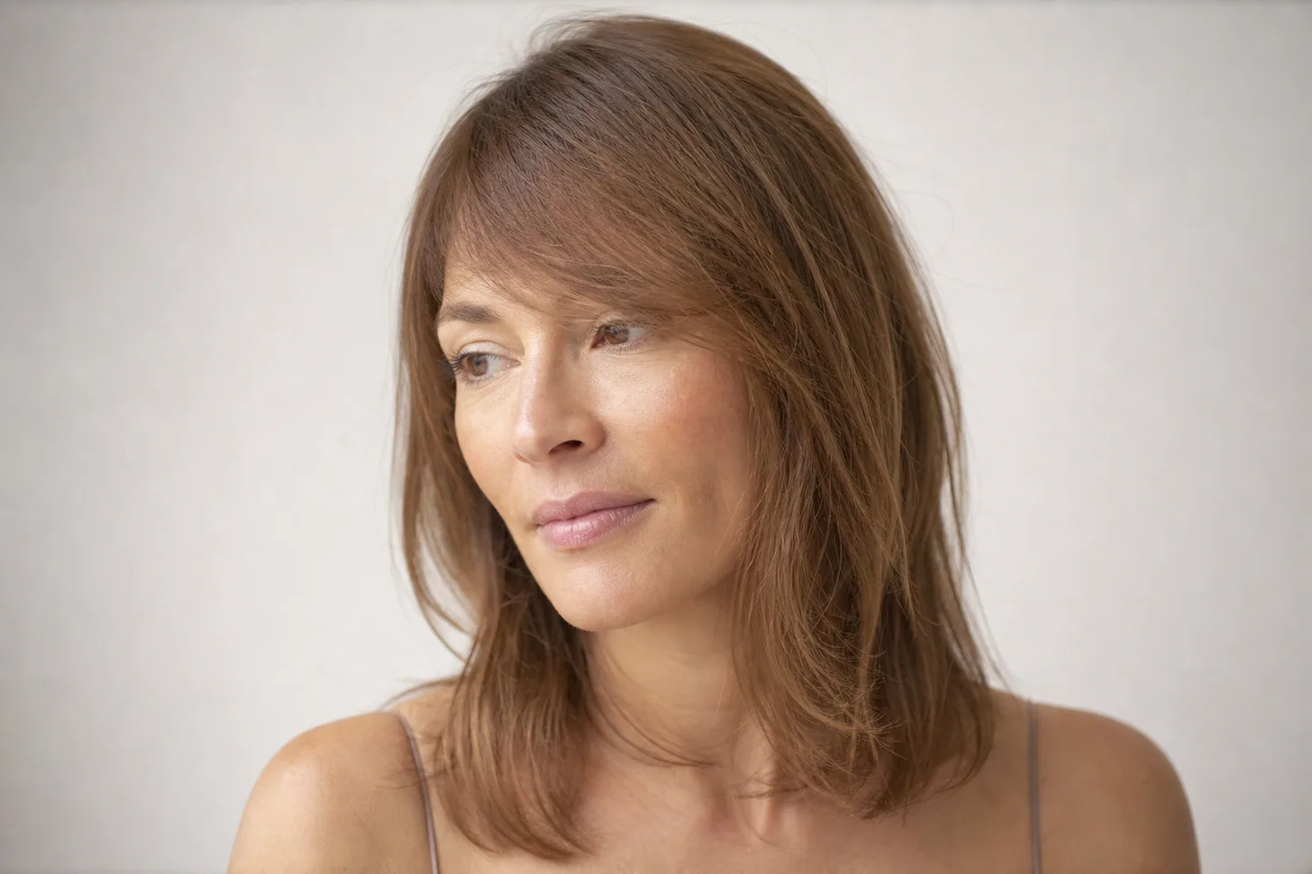 Side-swept bangs for thin hair